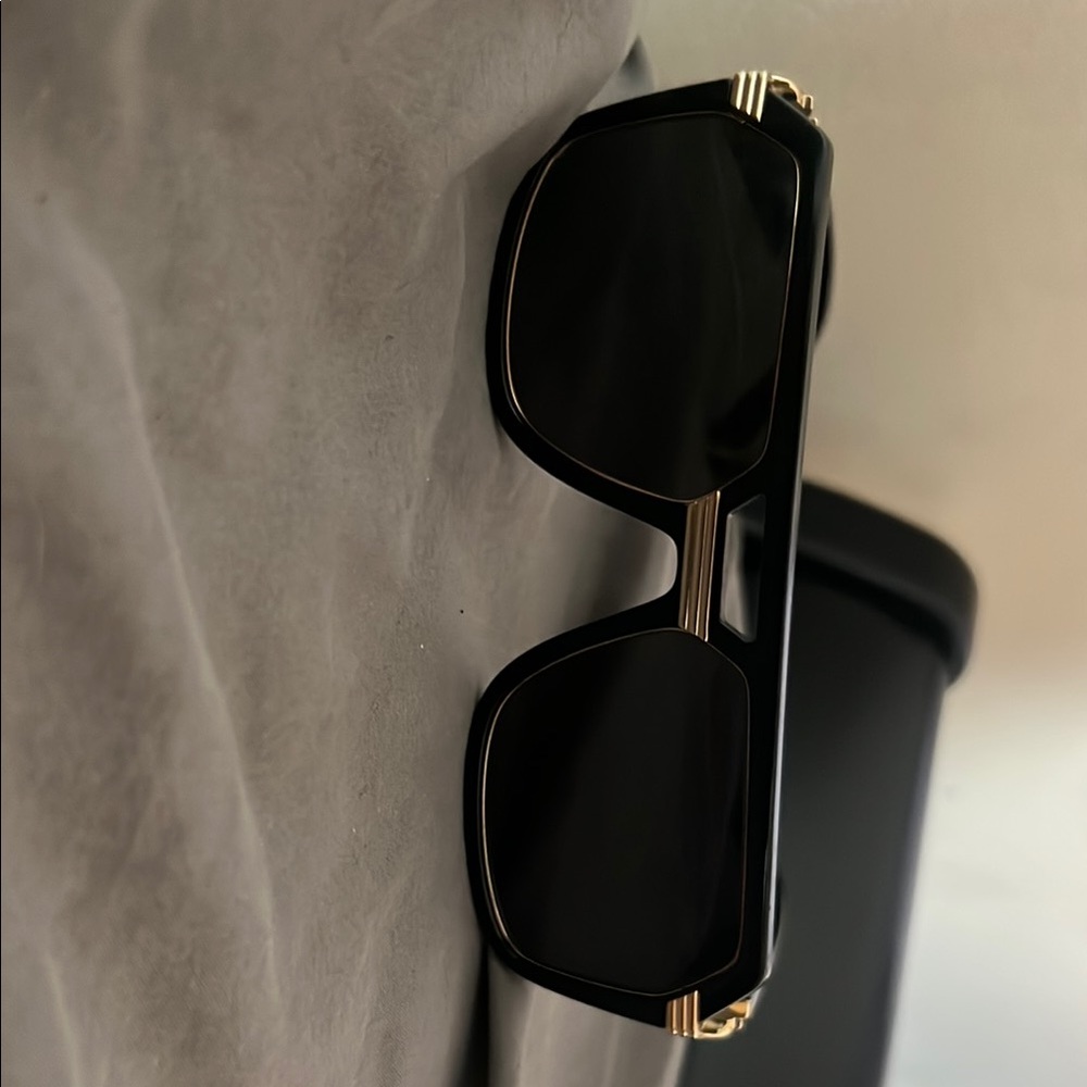 Versace Black and Gold Sunglasses with Modern Design